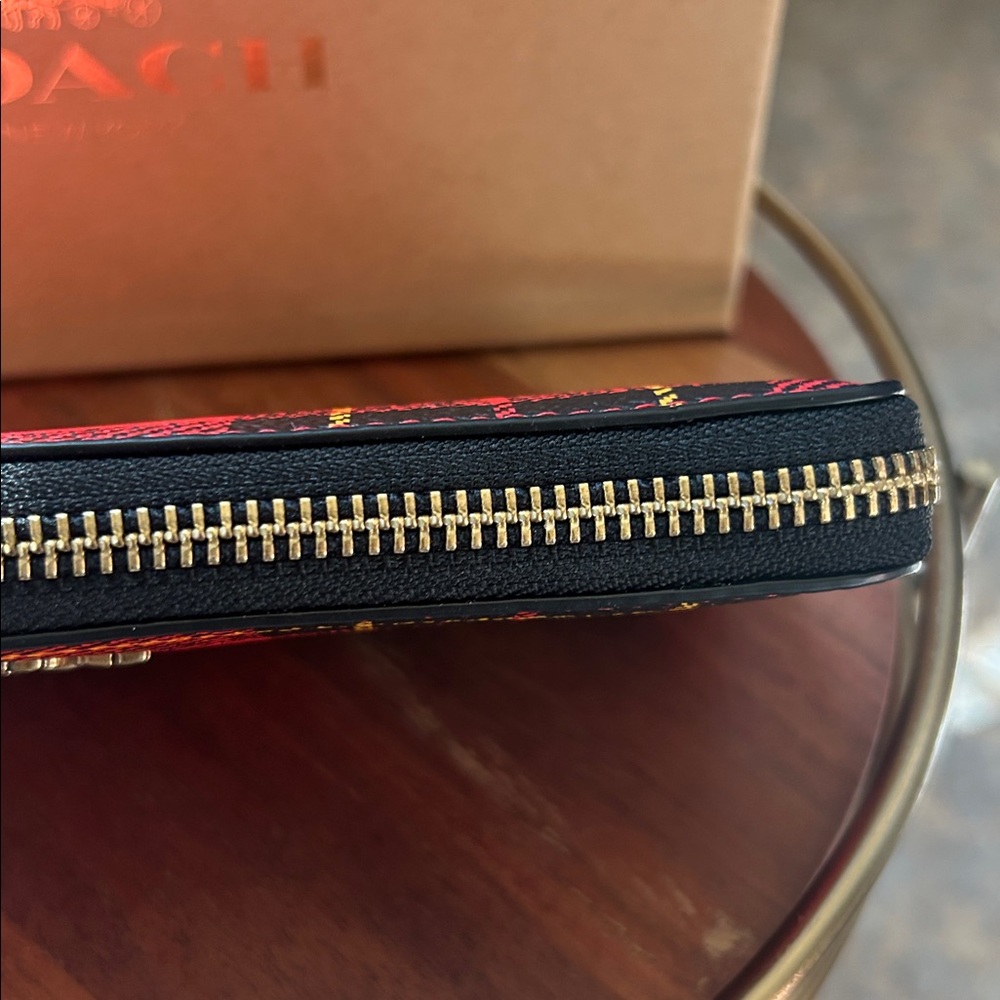 COACH style with the Boxed Slim Accordion Zip Wallet. Black/Red/orange, NWT - Picture 3 of 13